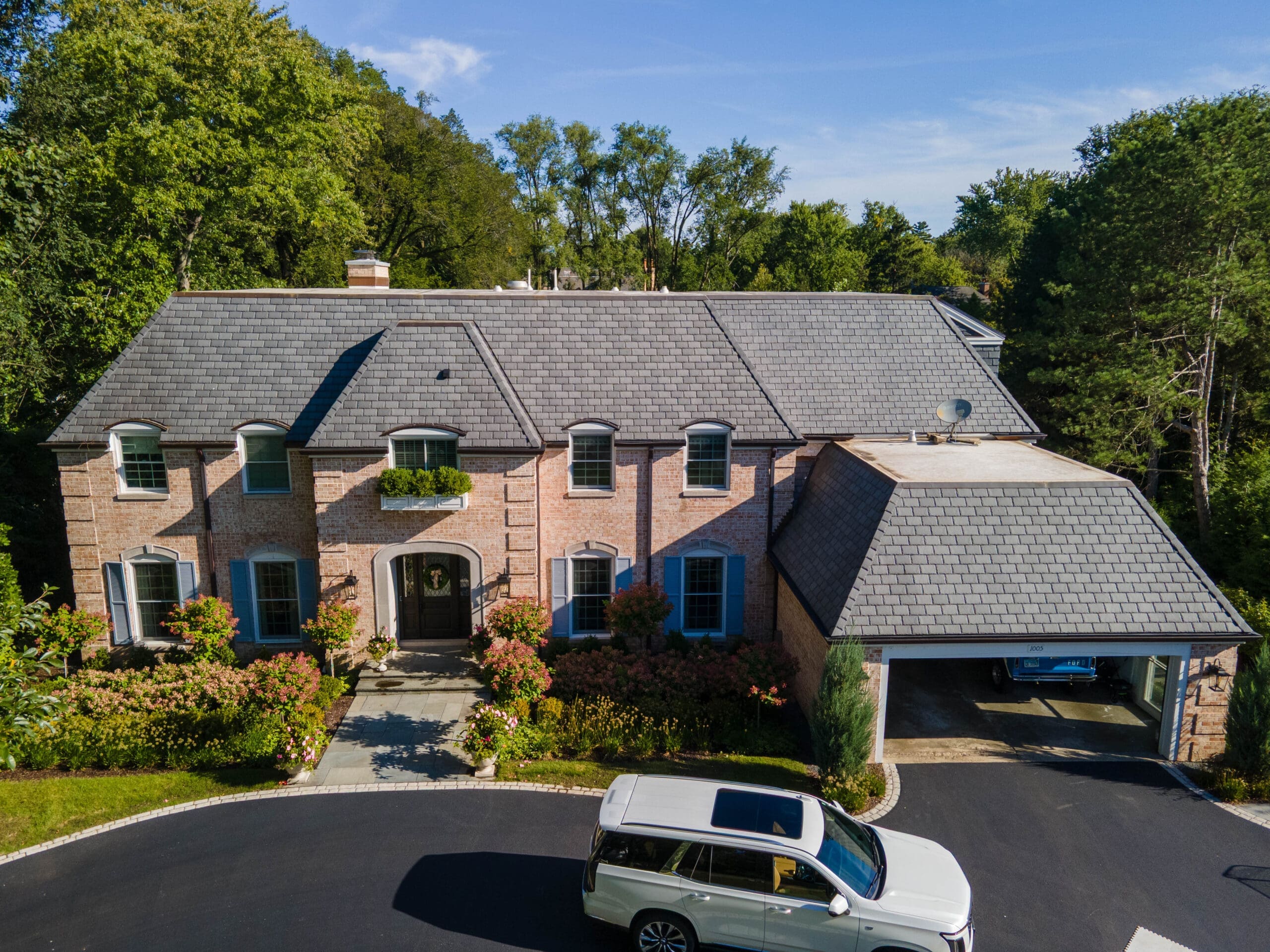 Finished exterior of Winnetka home featuring DaVinci slate roofing system