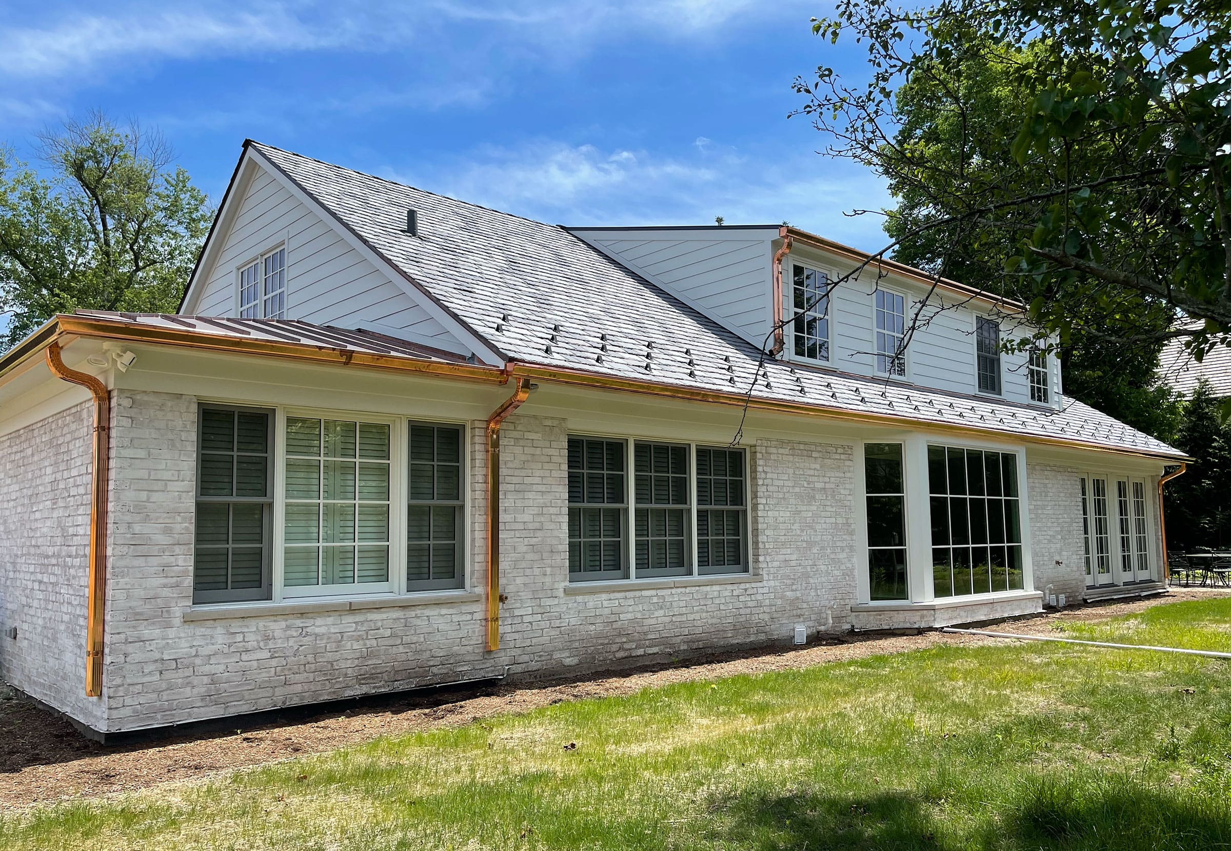 DaVinci synthetic slate roof installation by Wolf Development