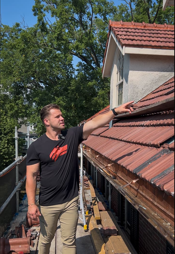 roofing specialist doing walk around in Evanston home tile roof