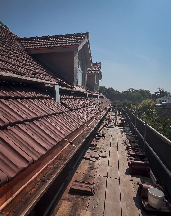 wolf development replacing historic tile roof in evanston