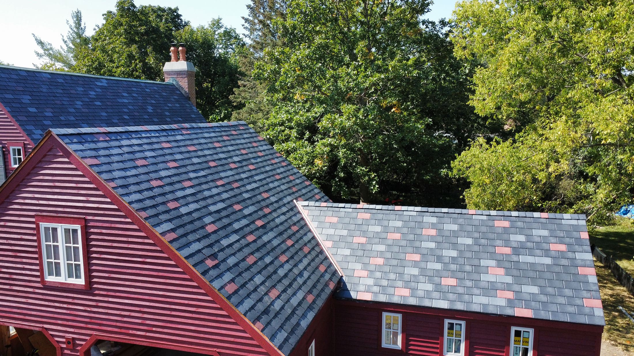 synthetic slate roof installation by Wolf Development roofing specialists
