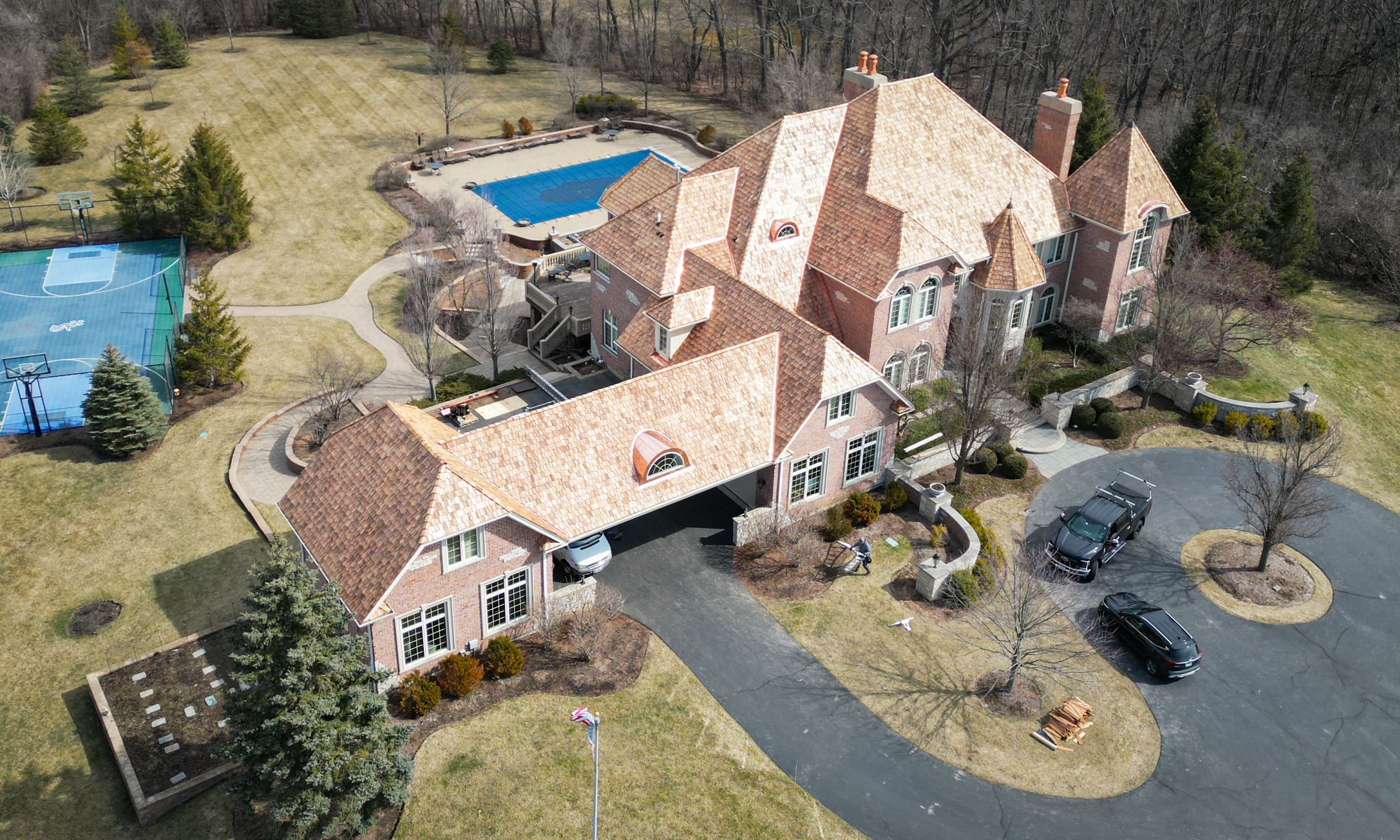 Exterior view of a completed cedar shake roof replacement in South Barrington