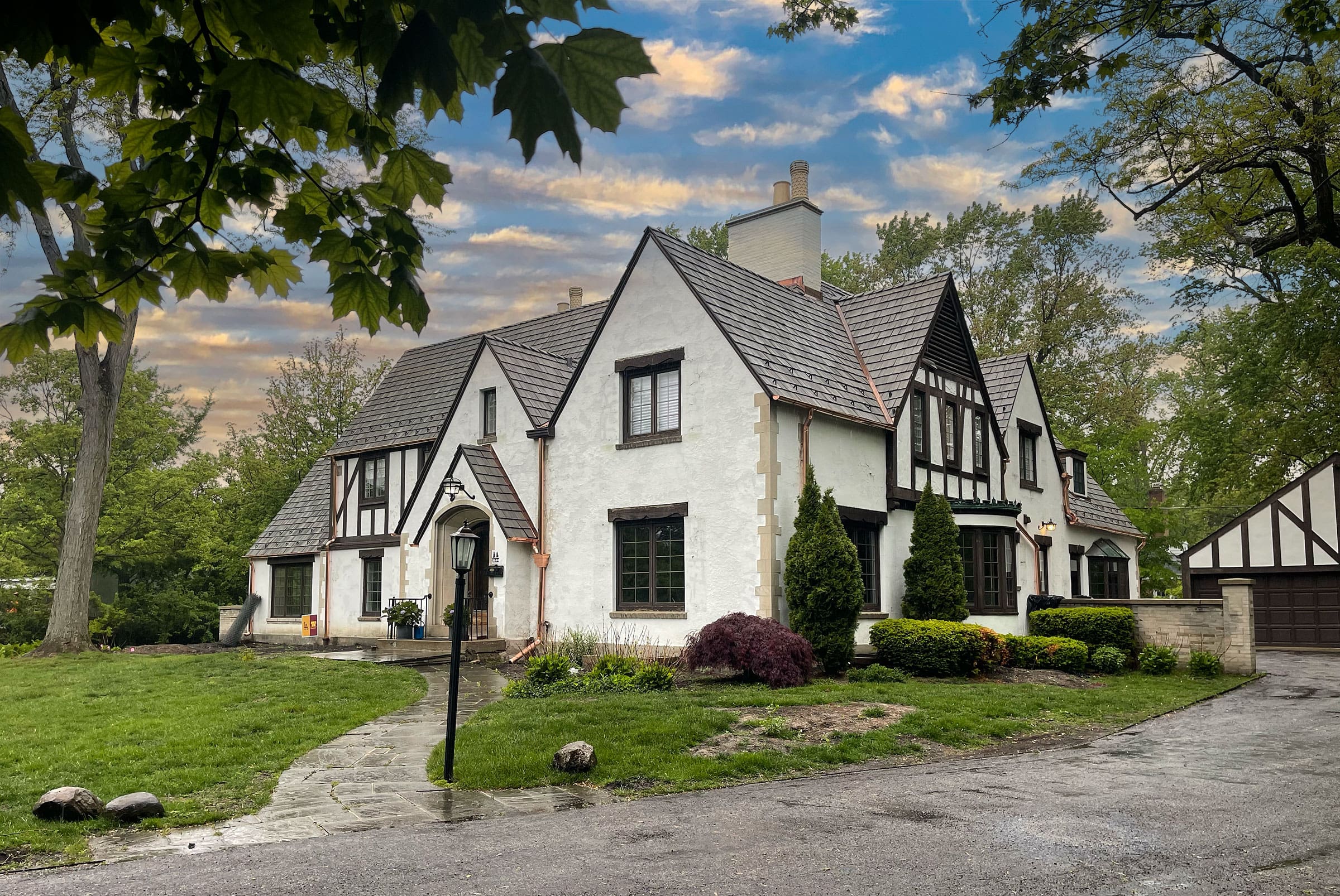 north shore cottage style home with brava synthetic shake roof