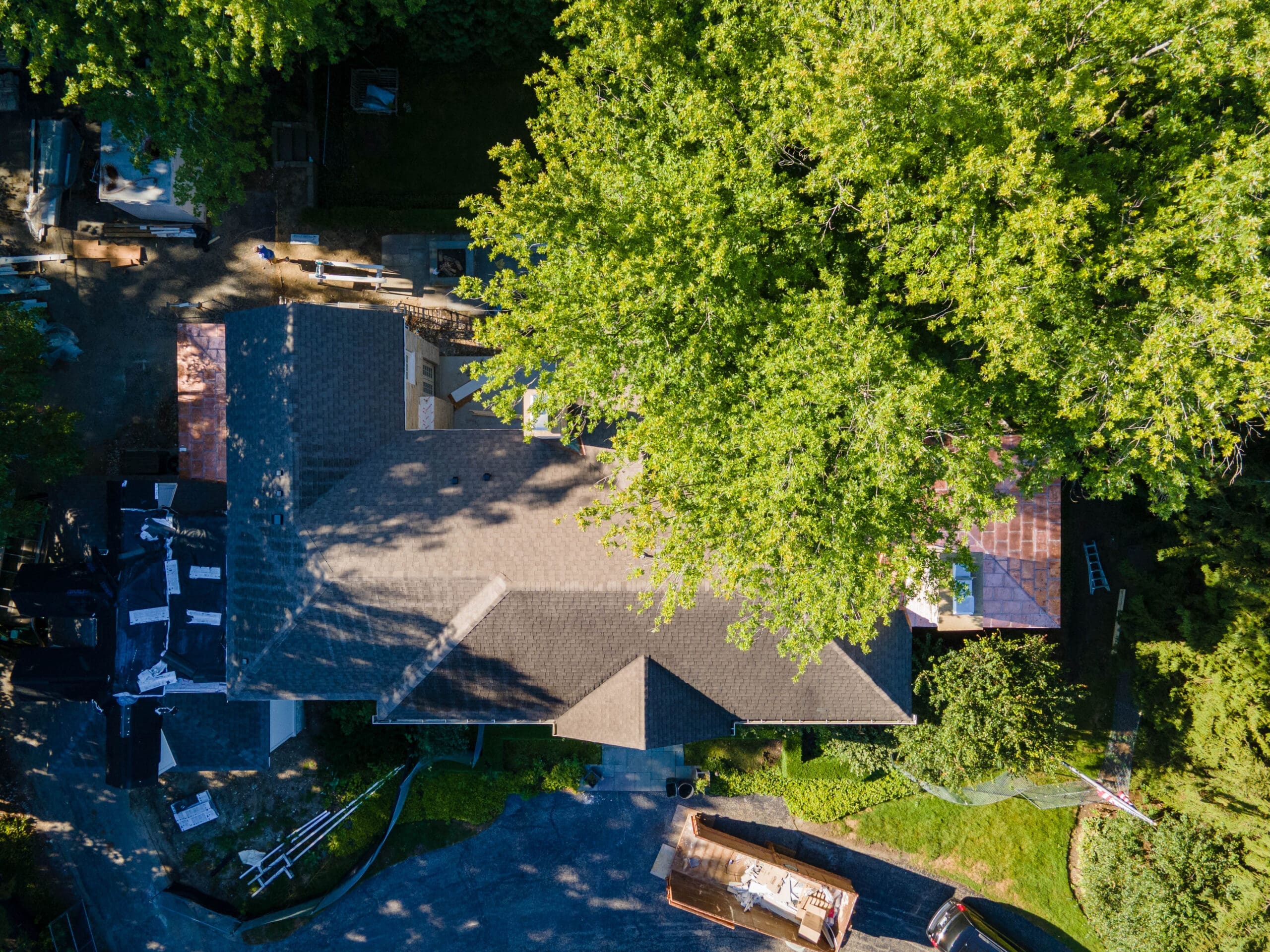 Wolf Development working on a home in winnetka installing architectural shingles