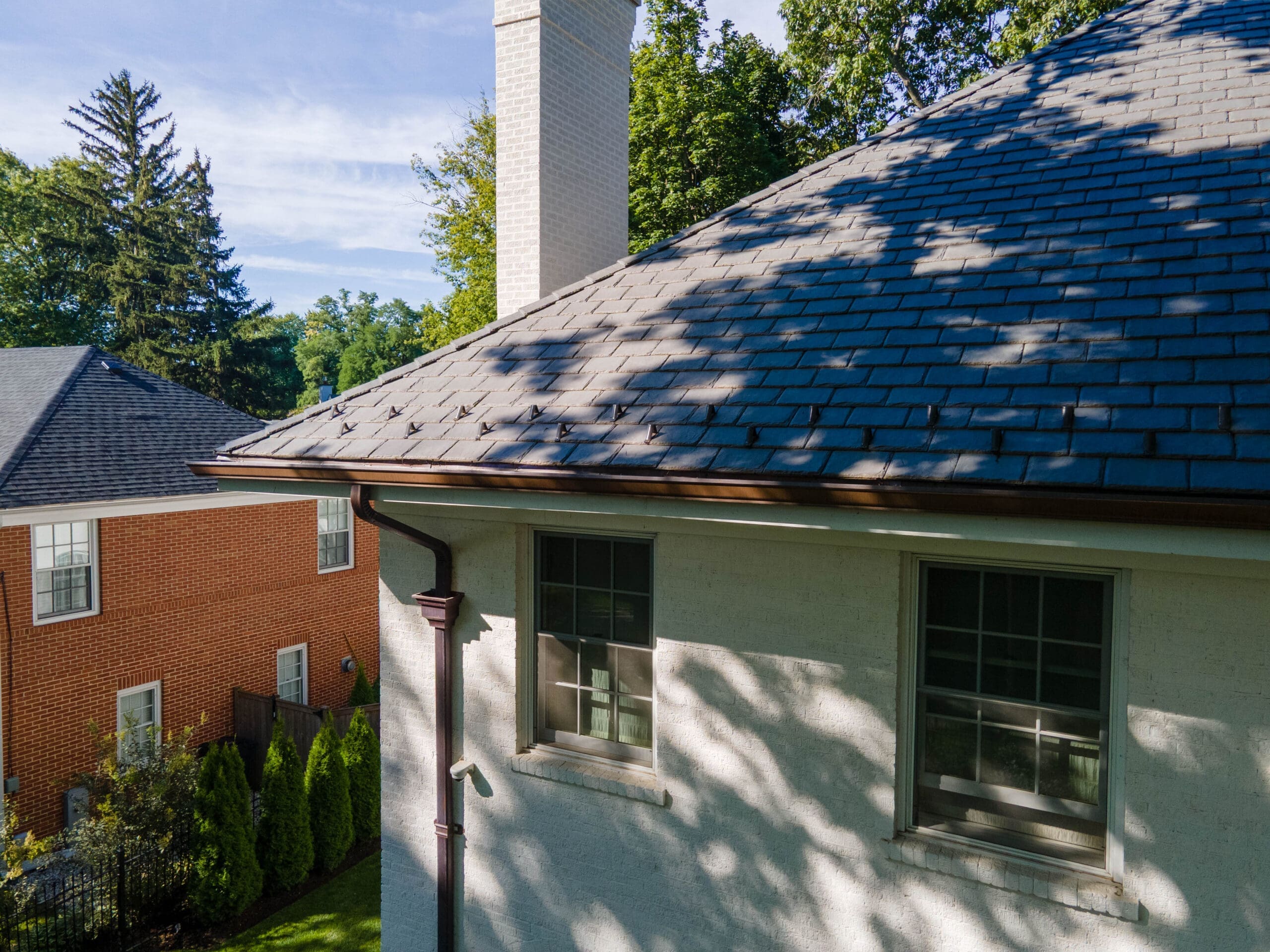 Copper gutter corner detailing on luxury roofing project in Winnetka Illinois