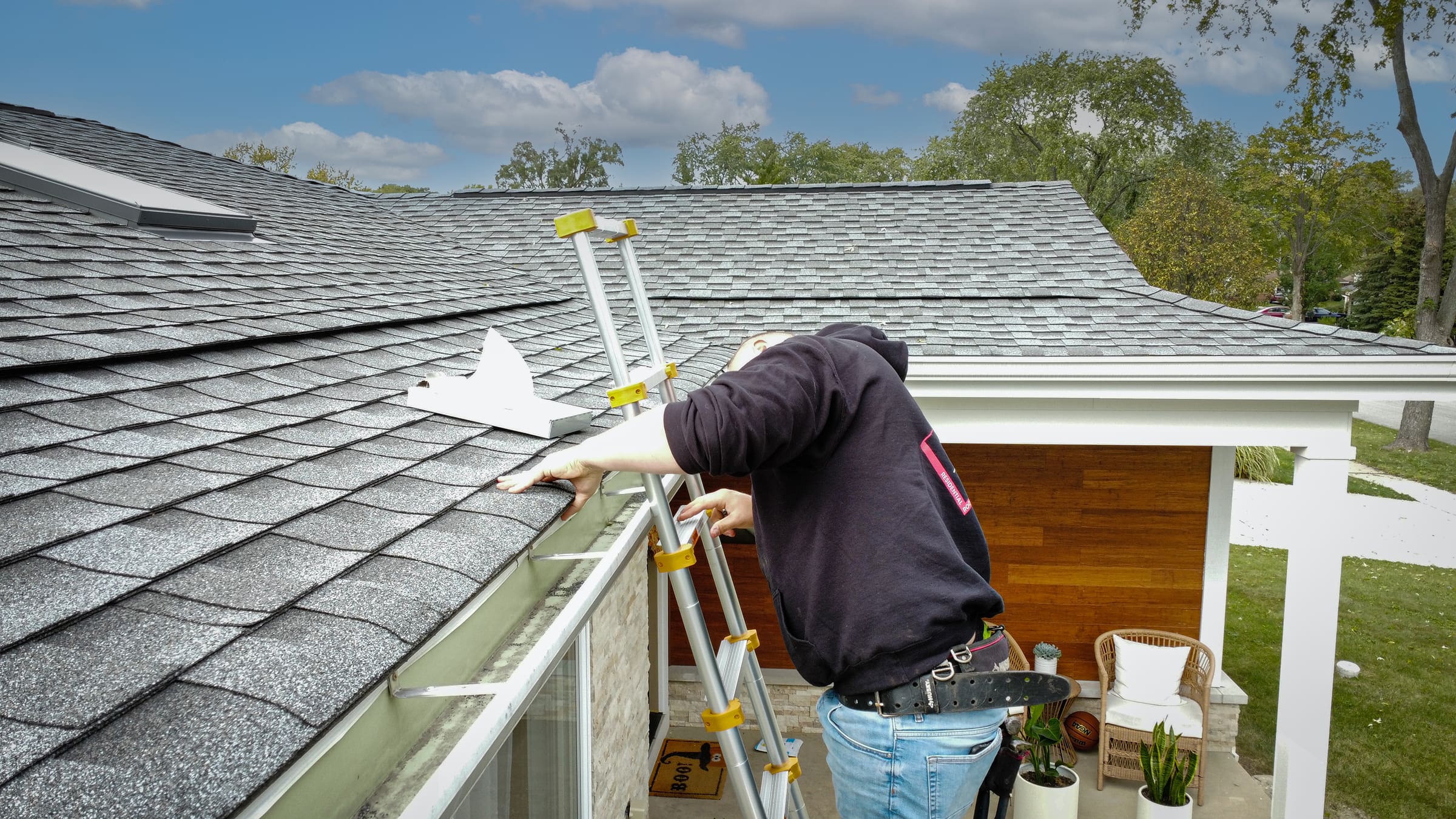 Close-up of architectural asphalt shingles showing layered design and texture-Edit