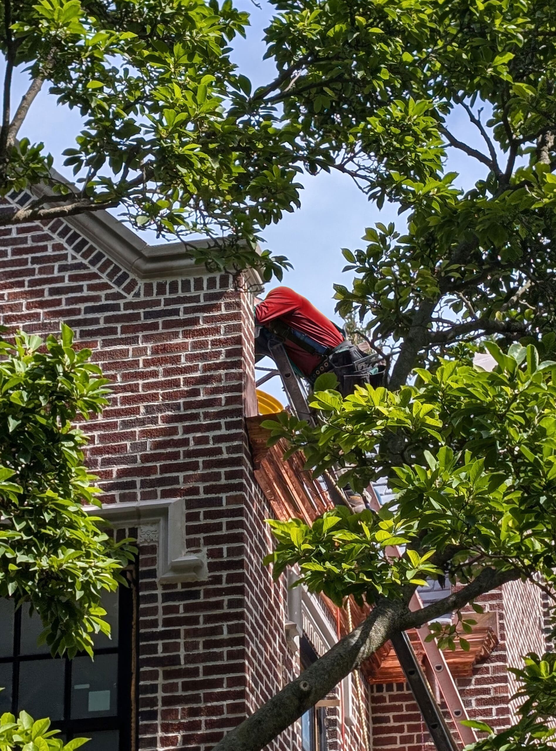 Wolf Development roofer working on a Kenilworth estate roof