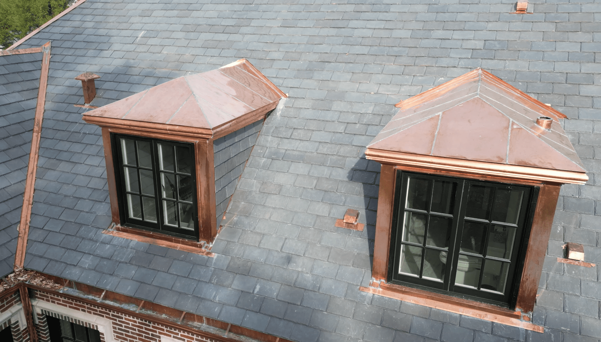 custom copper roof dormer kenilworth estate installed by roofing specialists at wolf development